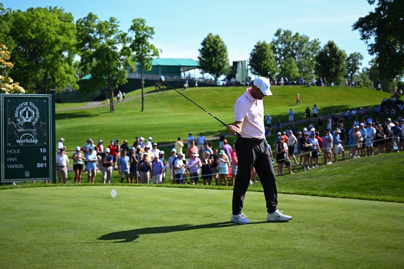 Jun 4, 2026; Dublin, Ohio, USA; Scottie Scheffler reacts to his shot from the 15th tee during the first round of the Memorial Tournament presented by Workday golf tournament. Mandatory Credit: Aaron Doster-Imagn Images