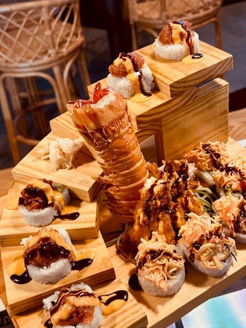 Wok lobster? A "Monster Lobster" roll is one of Wok by the Beach's items prepared for its "DDD" taping.