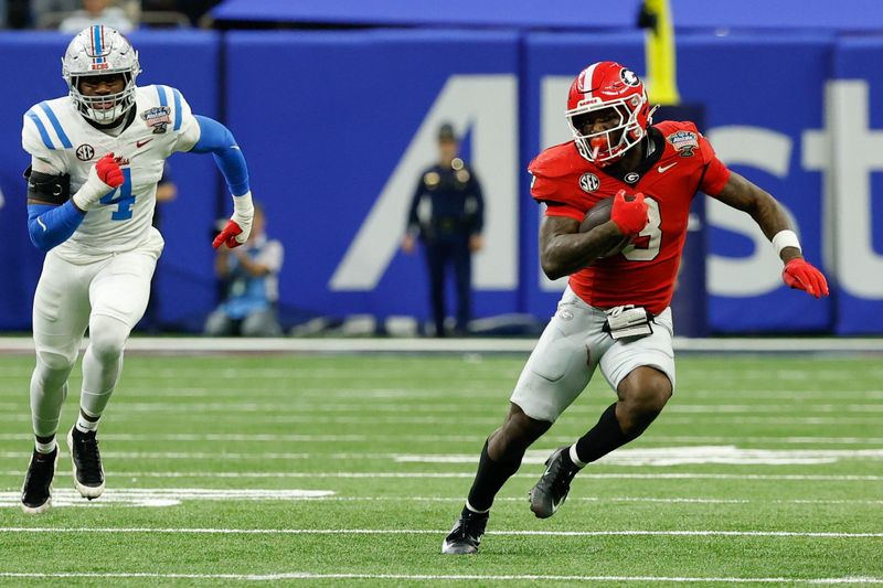 Jan 1, 2026; New Orleans, LA, USA; Georgia Bulldogs running back Nate Frazier (3) carries the ball against the Mississippi Rebels in the second quarter during the 2026 Sugar Bowl and quarterfinal game of the College Football Playoff at Caesars Superdome. Mandatory Credit: Geoff Burke-Imagn Images