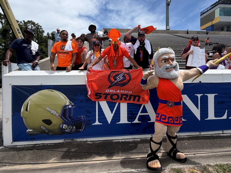 Orlando Storm fans, including mascot Kratos, cheer ahead of Orlando's UFL playoff game against the DC Defenders at Daytona Stadium on June 7, 2026.