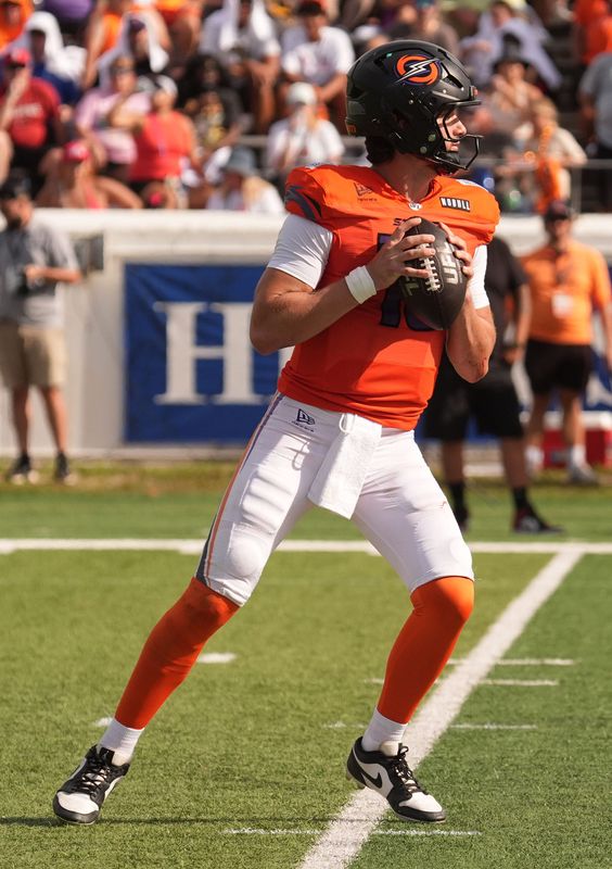 Orlando Storm quarterback Jack Plummer (13) looks for an open receiver during the UFL playoff game against the DC Defenders at Daytona Stadium on June 7, 2026.