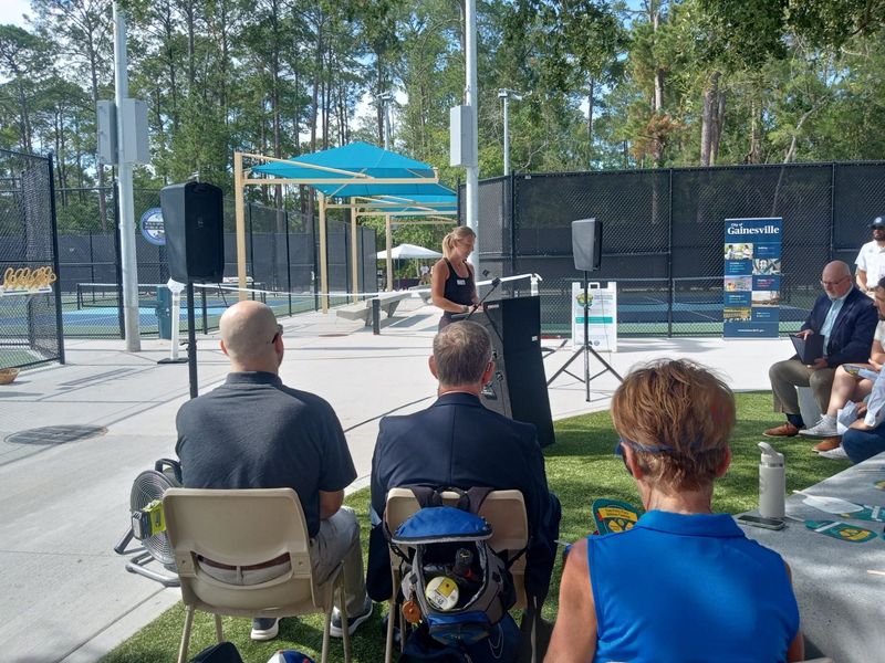 Rachel Mandell, director of Gainesville’s Wild Spaces and Public Places program, speaks about upgrades at Tom Petty Park during a June 6 ribbon-cutting ceremony.