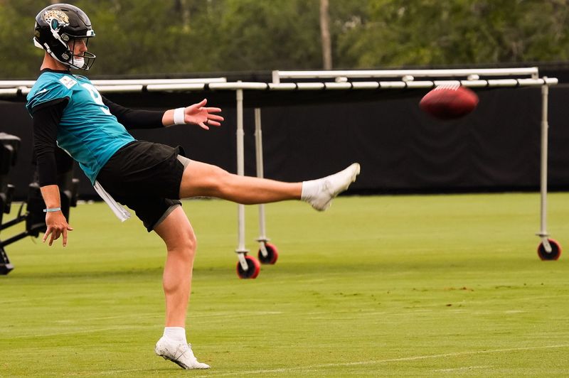Jacksonville Jaguars punter Logan Cooke (9) warms up during the second day of minicamp at the Miller Electric Center, Wednesday, June 10, 2026, in Jacksonville. [Doug Engle/Florida Times-Union]