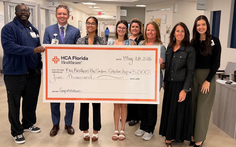 HCA Florida Fawcett Hospital recently awarded $2,500 scholarships to two students who participated in the hospital’s mentorship partnership with Big Brothers Big Sisters of the Sun Coast. From left, Anthony Sumo, mentor; Philip Marchesini, CEO; scholarship recipients Abigail Cornier and Haley Narine; mentors Erika Menz and Teresa Hayes; Kelly Carr, volunteer manager; and Alexandria Benjamin, community engagement director. “Through our partnership with Big Brothers Big Sisters, we have witnessed firsthand the students' dedication, resilience and commitment to achieving their goals,” Marchesini said.