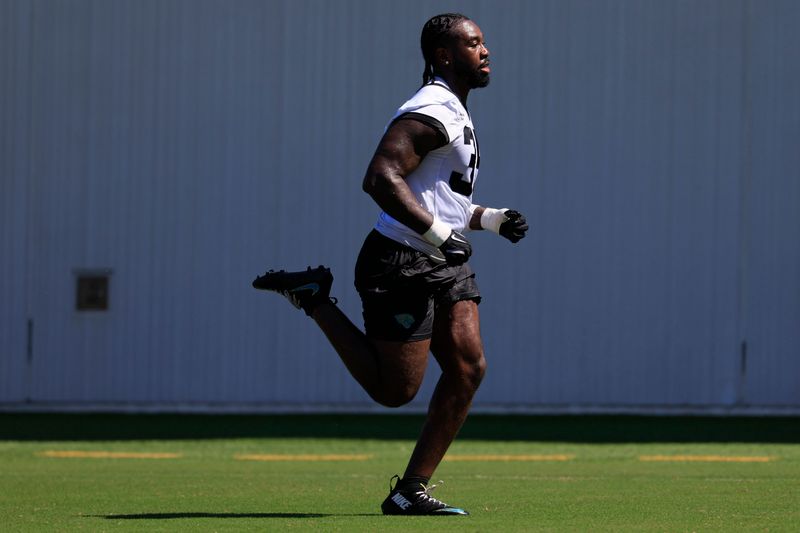 Jacksonville Jaguars linebacker Jalen McLeod (35) sprints during the third day of minicamp at the Miller Electric Center, Thursday, June 11, 2026, in Jacksonville, Fla.