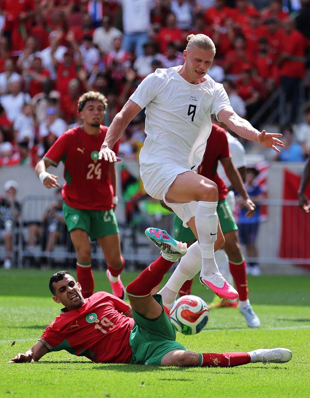June 7, 2026; Harrison, New Jersey, U.S.; Norway's Erling Haaland in action with Morocco's Youssef Belammari. Mandatory Credit: Brad Penner-Imagn Images