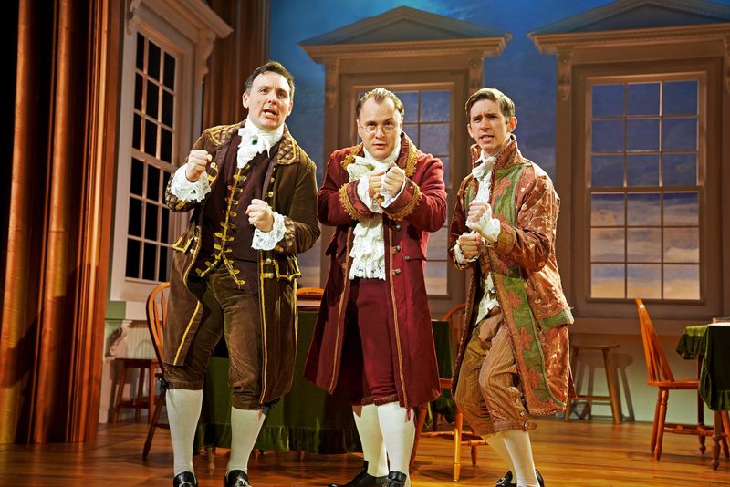 Christopher deJongh as "John Adams," Dennis Pisarz as "Benjamin Franklin" and Carson Skidmore as "Thomas Jefferson" in the musical "1776," on stage at Titusville Playhouse through July 12, 2026. Visit titusvilleplayhouse.com.