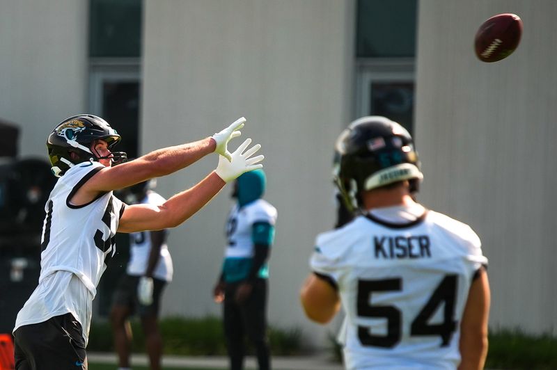 Jacksonville Jaguars linebacker Branson Combs (50) prepares to make a catch during a drill as the Jaguars held their final Organized Team Activity on Monday, June 15, 2026 at the Miller Electric Center in Jacksonville, Fla. [Doug Engle/Florida Times-Union]