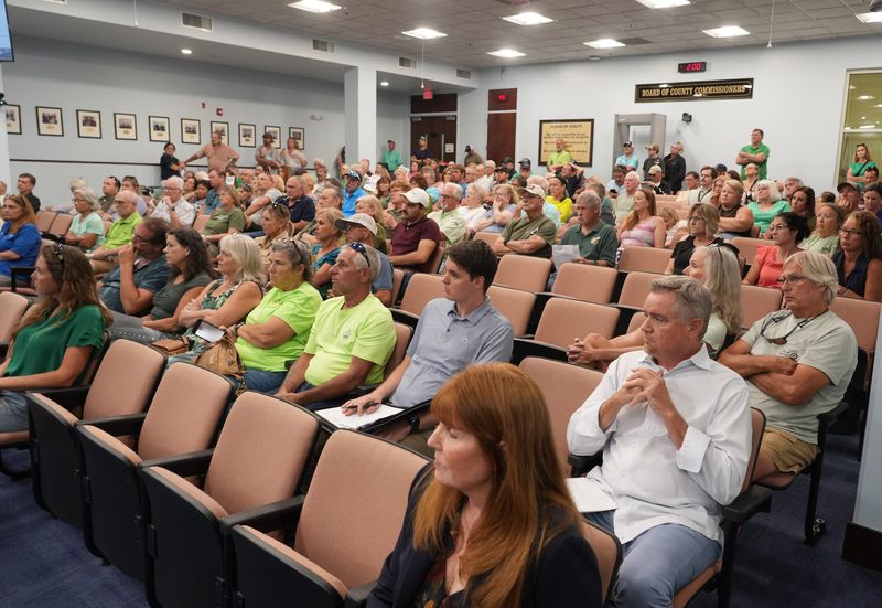 Turtle Mound neighborhood residents packed the Planning and Zoning Board meeting Monday afternoon, June 15 to voice their opposition to rezoning a 14-acre site in their neighborhood to increase density to allow more than 50 homes. The rezoning request was denied.