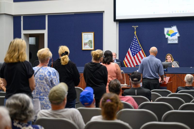 Residents line up to speak to the Board of County Commissioners during a Flagler County Commission meeting, Monday, June 15, 2026, in Bunnell.