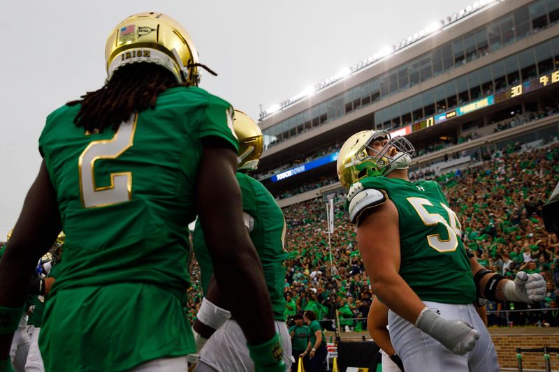 Notre Dame offensive lineman Anthonie Knapp (54) celebrates a Notre Dame touchdown during a NCAA college football game between Notre Dame and Louisville at Notre Dame Stadium on Saturday, Sept. 28, 2024, in South Bend.