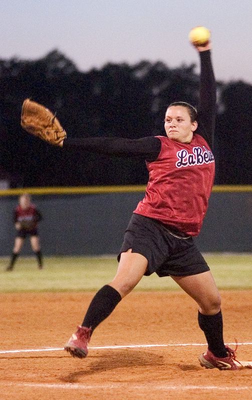 LaBelle High School junior Amanda Atun throws against Bishop Verot during the final inning of the District 3A-11 championship at Labelle Thursday night, April 28, 2005.