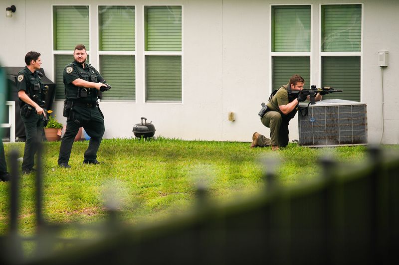 Nassau County sheriff’s deputies take up a position on a home on Timbercreek Boulevard near Andora Drive in Yulee during a standoff that ended with a suspect in custody June 16, 2026.