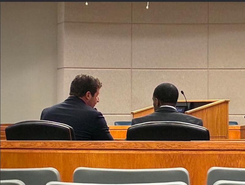 Blayze Jurien White, at right, and his lawyer Jonathan Mills having a conversation before the June 17, 2026 murder trial.