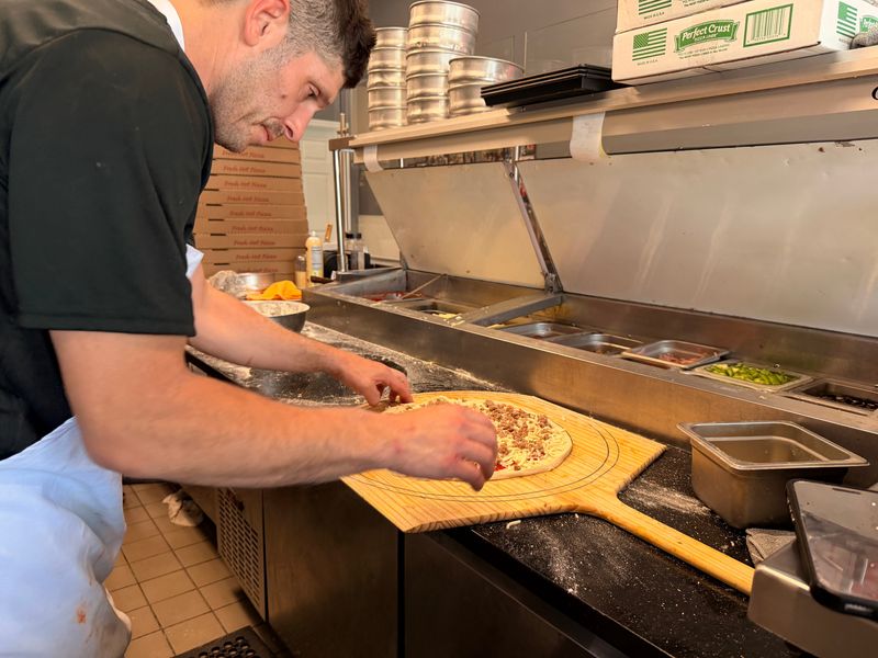 Labby's Pizzeria replaced Al Forno Pizza on Gatlin Boulevard in Port St. Lucie. Owner Jeremy Labianca makes a 14-inch lasagna pizza.