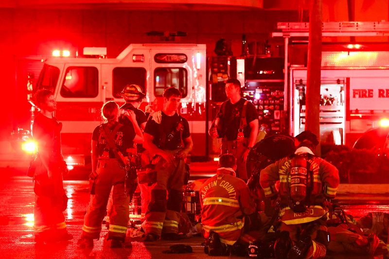 Multiple Martin County Fire Rescue and Stuart Fire Department units work to extinguish a fire on the roof of the Dillard’s department store, June 17, 2026, at the Treasure Coast Mall.
