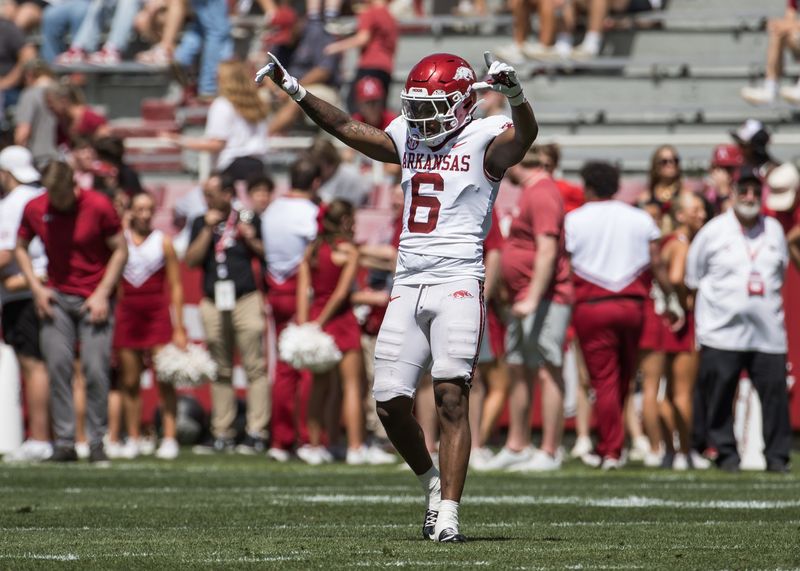 Apr 25, 2026; Fayetteville, AR, USA;  Arkansas Razorbacks defensive back Khmori House (6) celebrates after breaking up a pass play during the spring game at Donald W. Reynolds Razorback Stadium. Mandatory Credit: Brett Rojo-Imagn Images