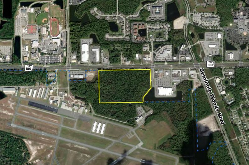 An aerial photo outline the approximately 38-acre property where a Walmart Supercenter is proposed along State Road 100 in Palm Coast.