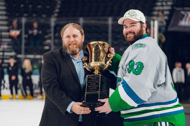Florida Everblades goalie Cam Johnson accepts the June M. Kelly Playoffs MVP Award after the Blades won Game 6 of the Kelly Cup Finals against the Kansas City Mavericks in Independence, Missouri on Monday, June 15, 2026.