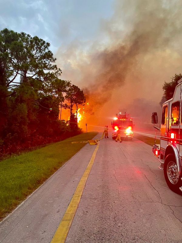 A brush fire broke out just before 5 p.m. June 20, 2026, near Southeast Old Cypress Drive and Southeast Flora Avenue in Hobe Sound, Florida, according to Martin County Fire Rescue.