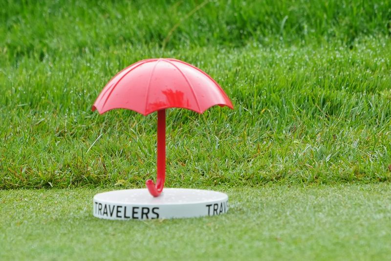 The Travelers Championship red umbrella tee box marker.