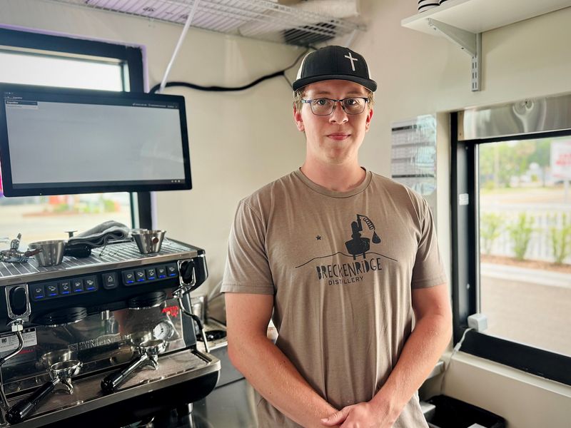 SunBros Café Co-owner Abrien Sundell poses for a photo inside the brand's new Ormond Beach shop.