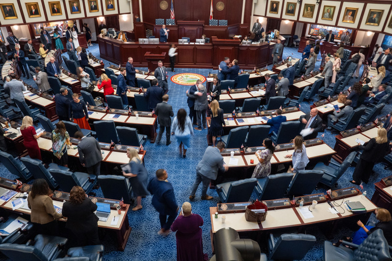 Representatives pack up, hug one another and head out the chamber doors after completing a special session regarding property taxes on June 2. The property tax cuts head to the November ballot, but some Volusia residents are unsure how they will vote.