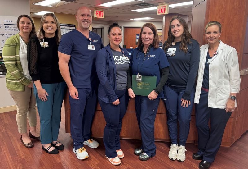 Gwen Vetter (third from right), an RN on the progressive care unit at Sarasota Doctors Hospital, was recently honored with the DAISY Award for extraordinary clinical skill and compassionate care. “Gwen was the kind of nurse you never forget," a recent patient's family member said. Vetter has worked in health care for more than 40 years, starting as an LPN before nursing school. “I go into every patient’s room and do the best I can," Vetter said. "I want to help them get better and get their health back."