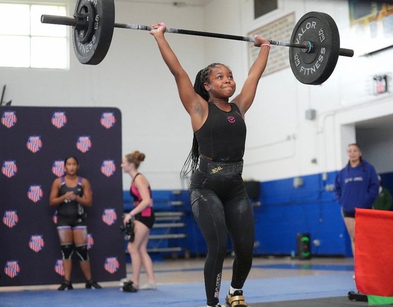 Winter Haven's lifter Kamauni Hendrix competes in an AAU state series meet. She's one of many athletes in Polk competing in the high-level state meet.