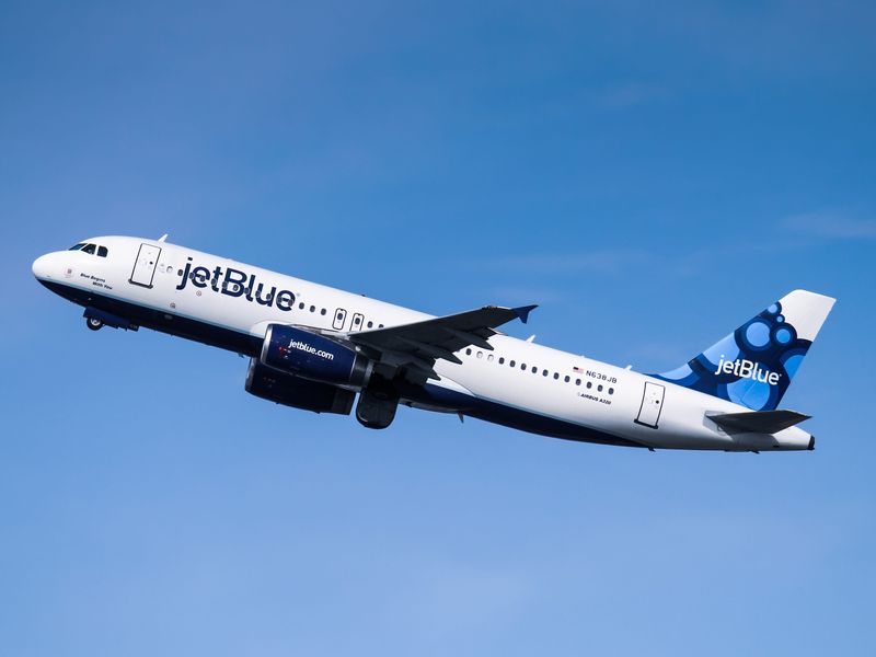 A JetBlue plane is seen in the air after takeoff in this undated photo.