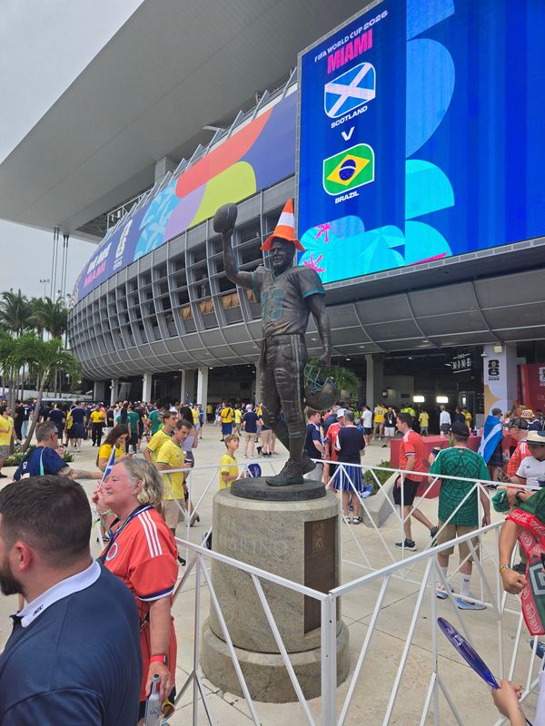 Scotland's Tartan Army placed a traditional orange traffic cone on the top of a Dan Marino statue ahead a World Cup match with Brazil on Wednesday, June 24 at Hard Rock Stadium in Miami Gardens.