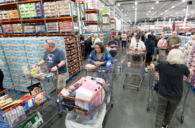 People shop at Costco as it opens in Pensacola on June 25, 2026.
