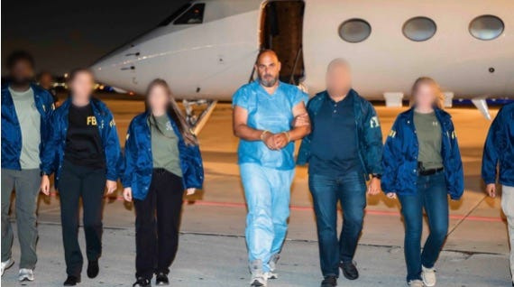 Ibrahim Khaldoon Hilmi of Miami is shown here, being returned to the United States after fleeing to Cyprus.