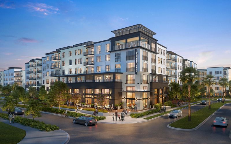 This rendering shows the exterior of a proposed 355-unit multifamily complex built by Woodfield Development on a 4.5-acre portion of Sarasota Square. The community will feature a mix of one-, two-, and three-bedroom units ranging from 768 to 1,626 square feet.