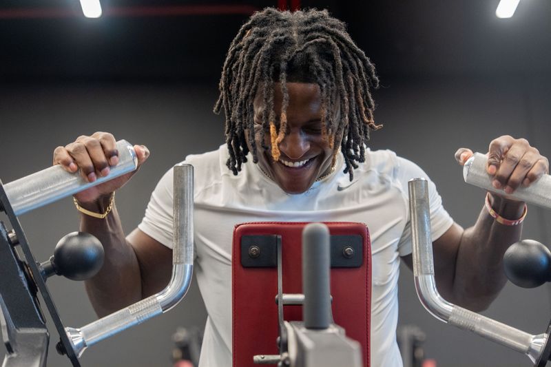 Florida State linebacker Ethan Pritchard does a set of weighted upper body exercises during his physical therapy session at the FSU football facility on Friday, June 26, 2026. Pritchard continues to make big strides in his journey to recovery after being shot in the head in August 2025.