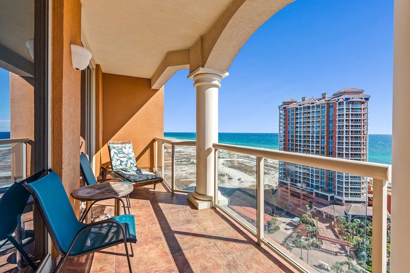 Enjoy meals al fresco on your waterfront balcony. 