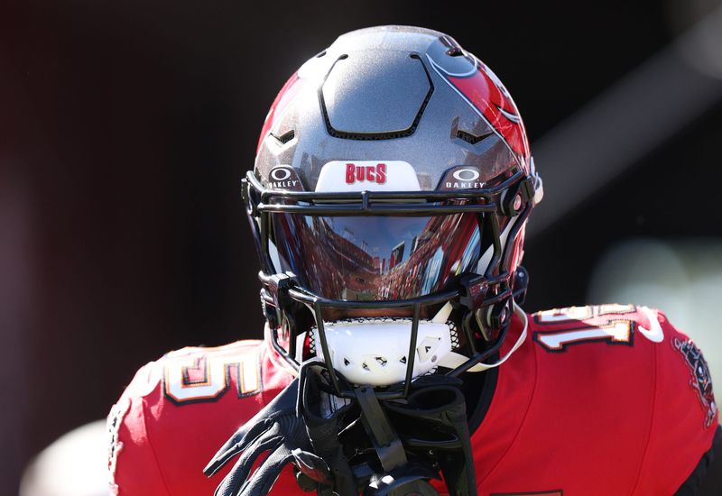 Nov 30, 2025; Tampa, Florida, USA;  Tampa Bay Buccaneers wide receiver Tez Johnson (15) warms up before a game against the Arizona Cardinals at Raymond James Stadium. Mandatory Credit: Nathan Ray Seebeck-Imagn Images