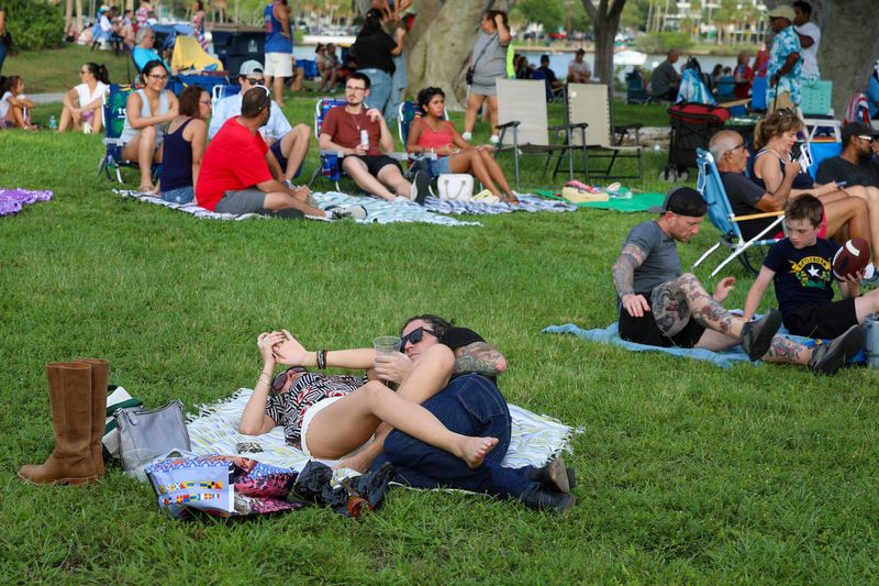 Chairs and blankets for comfort at the firework show The historic Gator Club on Main and S. Lemon hosted its first 4th of July Block Party from 5 PM - 12 AM with live bands and a DJ, corn hole, street vendors and food trucks. The party was geared for 21 and over but many families attended earlier in the day. A firework show was held on the bay front at 9:00 PM with thousands in attendance, and with road closures for safety many people enjoyed the show from the John Ringling Causeway.