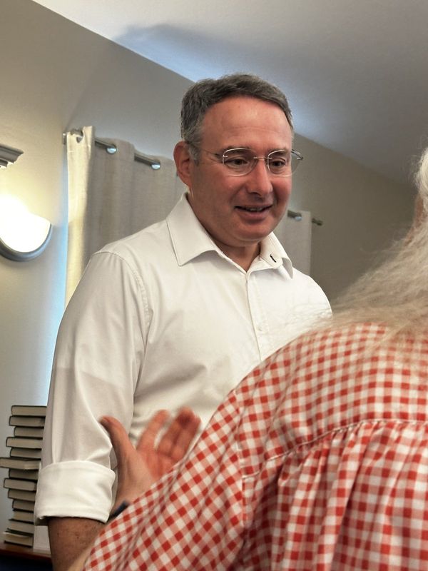 U.S. Senate candidate Alex Vindman, a Democrat, greets attendees of his speech at the Unitarian Universalist Congregation of Ormond Beach on July 6, 2026.