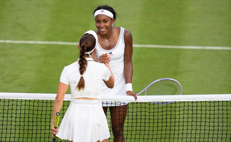 Jun 29, 2026; London, United Kingdom;  Coco Gauff of the United States at the net with Tamara Korpatsch of Germany after their match on day one at All England Lawn Tennis and Croquet Club. Mandatory Credit: Susan Mullane-Imagn Images