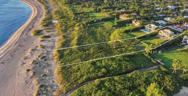 In this photo illustration, a digitally added white perimeter line defines an estate at 143 E. Inlet Drive near the inlet in Palm Beach. The estate just changed hands for about $31.78 million.