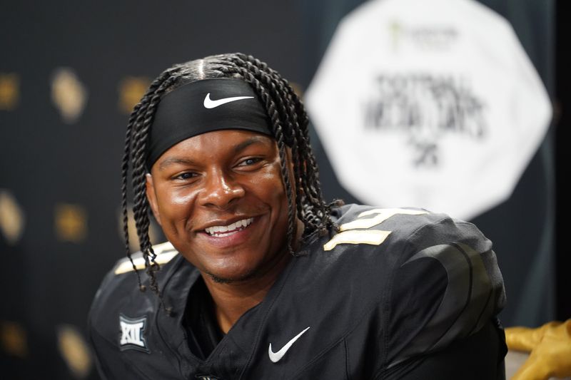 Jul 7, 2026; Frisco, TX, USA;  UCF quarterback Alonza Barnett III speaks with reporters during Big 12 Conference Football Media Days at The Star. Mandatory Credit: Raymond Carlin III-Imagn Images