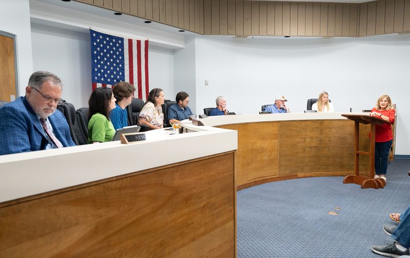 Sherry Chapman, right, expresses her view about the town manager situation during the city council meeting at the city hall in Jay on July 7, 2026.