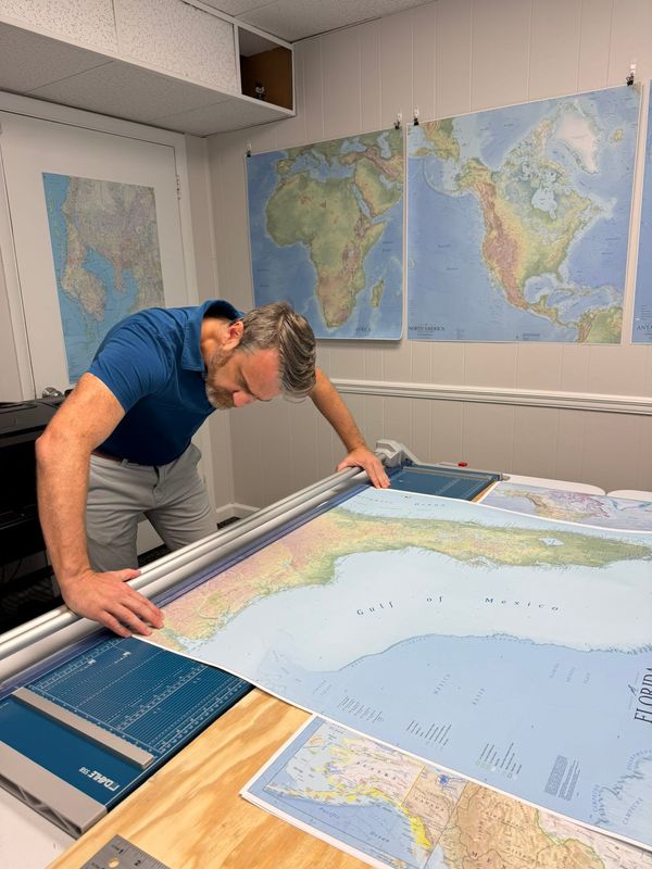 James Gaddis works on his new Ridgeline Geographic mapmaking business in his Tallahassee home office on July 10, 2026. Gaddis was fired from DEP after leaking Gov. Ron DeSantis’ Great Outdoors Initiative to build golf courses and lodges in Florida state parks.