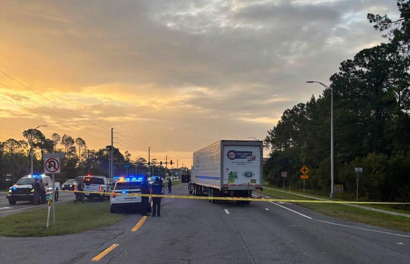 A semi-truck remains at the scene of a fatal crash involving a pedestrian on Florida 16 early July 14 as the St. Johns County Sheriff's Office blocks off the area.