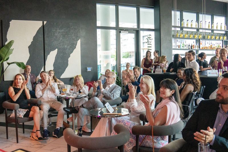 Attendees applaud Bianca Rosarrio and The Smooth Operators at the Red Velvet Jazz Rooftop Series on June 30.