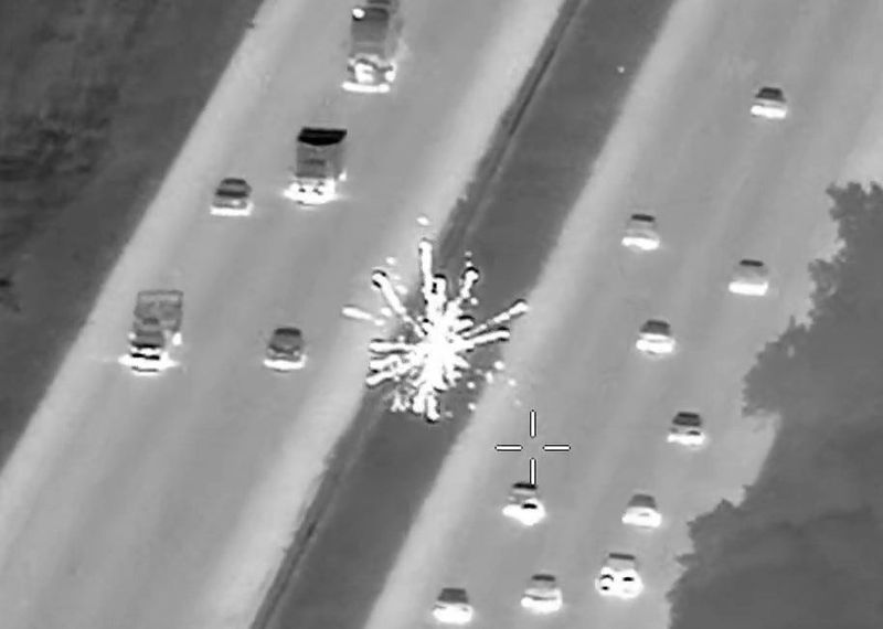 Video from a St. Johns County Sheriff's Office helicopter shows fireworks being launched from a vehicle on I-95 on July 4.