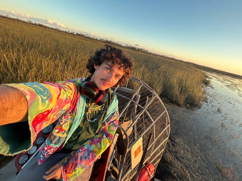Larkins colorful and bold outfit choices help him stand out in the Everglades environment.