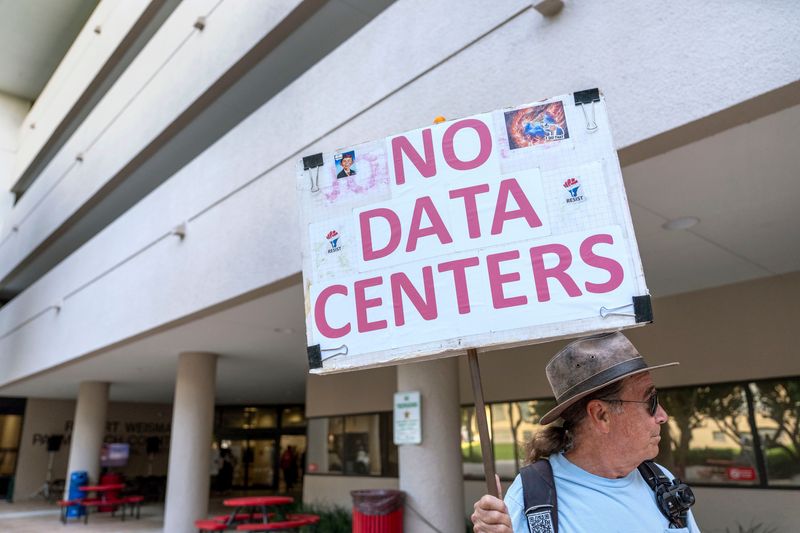 Steve Graybill protests the Project Tango data center before the Palm Beach County Commission on July 15, 2026, in West Palm Beach, Florida.