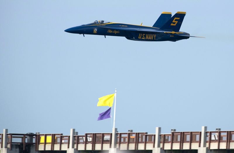 The U.S. Navy Blue Angels streak across the skies over Pensacola Beach during the annual Breakfast with the Blues event on July 15, 2026.